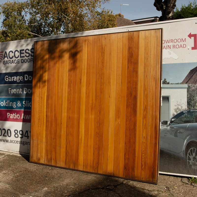Hormann 2009 Vertical Basecoat Treated Retractable Garage Door in Timber