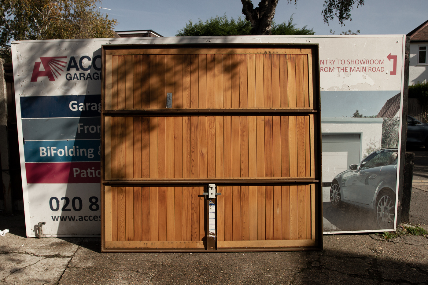 Hormann 2009 Vertical Basecoat Treated Retractable Garage Door in Timber
