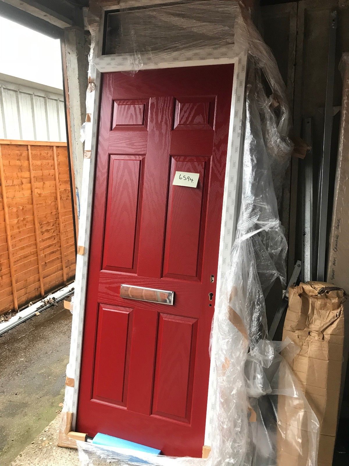 Hormann ThermoComp TR01 with Fanlight in Signal Red