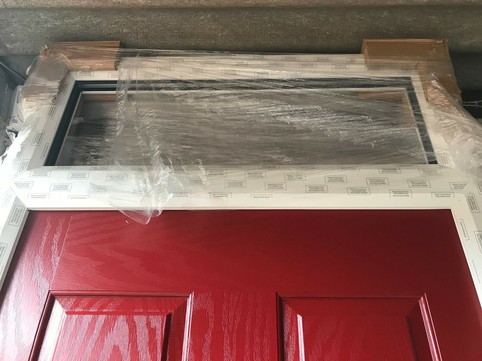 Hormann ThermoComp TR01 with Fanlight in Signal Red