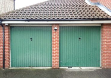 twin-garage-door-conversion-before-1