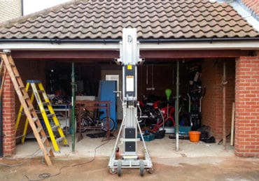 twin-garage-door-conversion-during-1