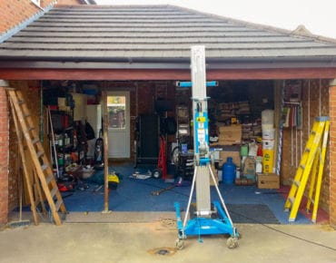 twin-garage-door-conversion-during-2