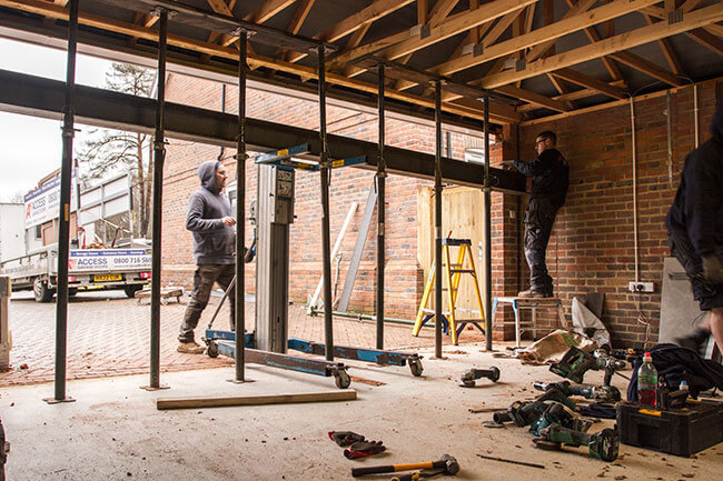 Access Garage Doors team working on a garage doors installation