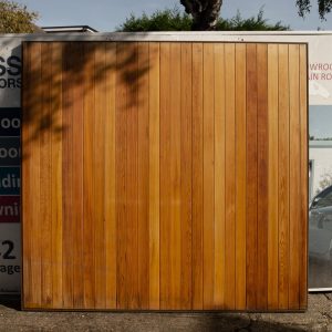 Hormann 2009 Vertical Basecoat Treated Retractable Garage Door in Timber