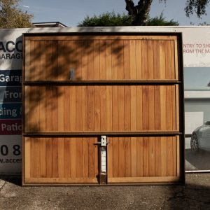 Hormann 2009 Vertical Basecoat Treated Retractable Garage Door in Timber