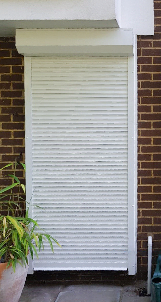 A SeceuroGlide 3800 Security Shutter in White