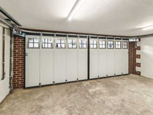 Ryterna SSD side sliding garage door finished in Farrow & Ball's Studio Green - inside garage view