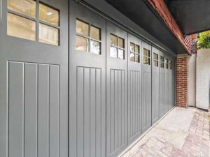 Ryterna SSD side sliding garage door finished in Farrow & Ball's Studio Green - side view