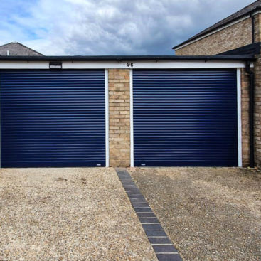 2x SeceuroGlide Compact Insulated Roller Garage Door finished In Navy Blue