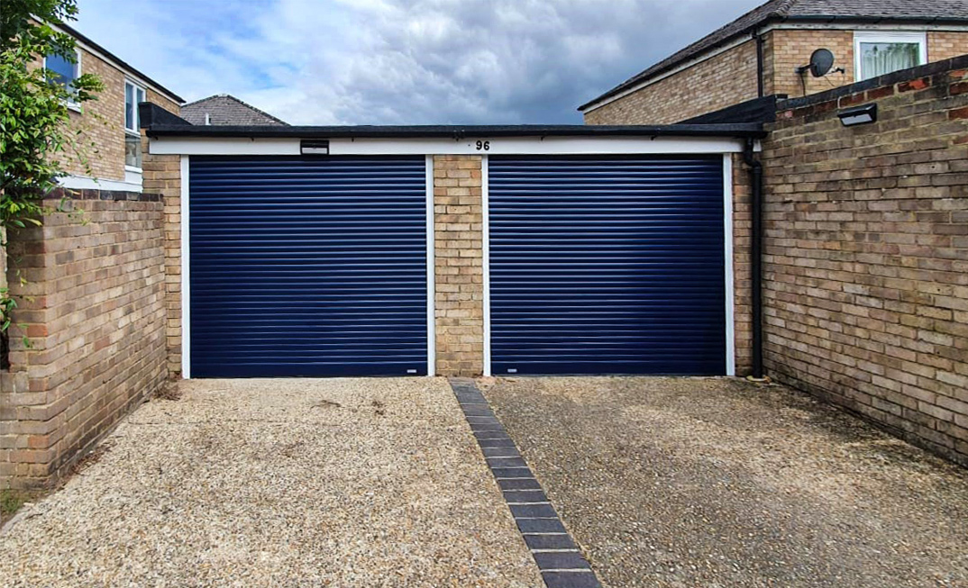 2x SeceuroGlide Compact Insulated Roller Garage Door finished In Navy Blue