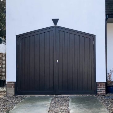 A Woodrite Arched Side Hinged Door in Jet Black