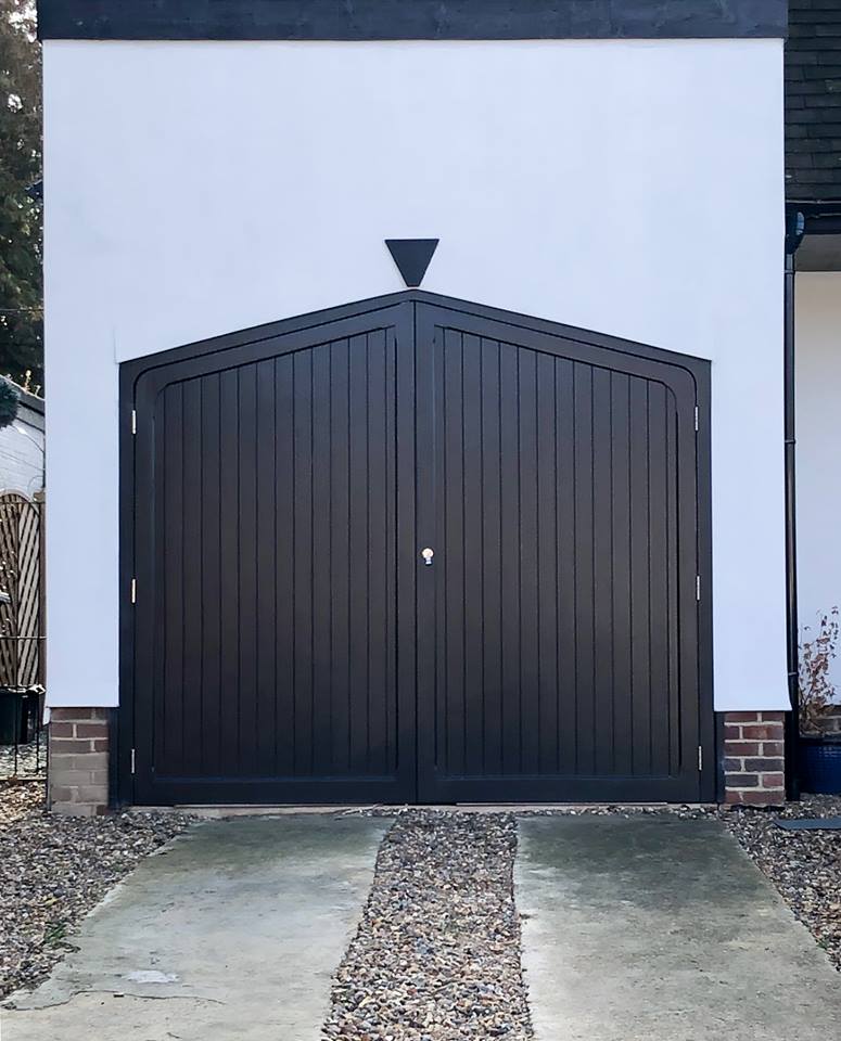 A Woodrite Arched Side Hinged Door in Jet Black