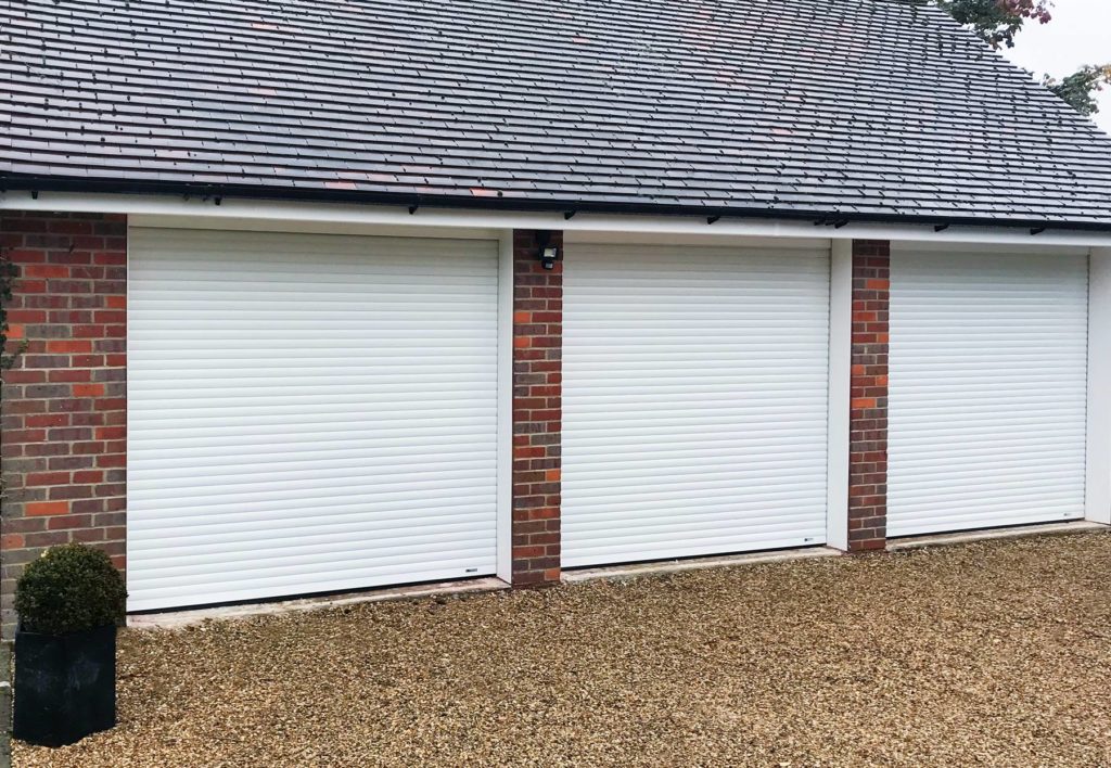 3 x SWS Seceuroglide Compact Roller Doors (Finished in white, fully boxed with UPVC cladding for reveals) installed near Aylesbury by our Watford branch.