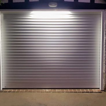 An SWS Seceuroglide Roller Garage Door finished in White