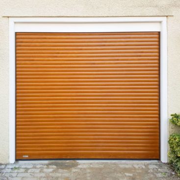 A SeceuroGlide Compact Roller Door in Golden Oak