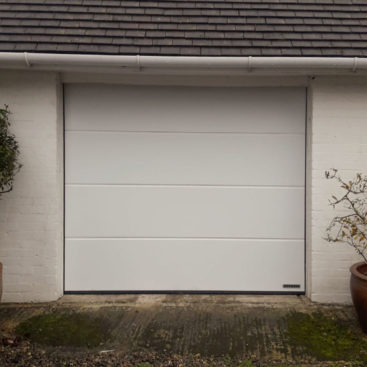 Hormann Insulated Sectional Garage Door Finished in White Silk Grain