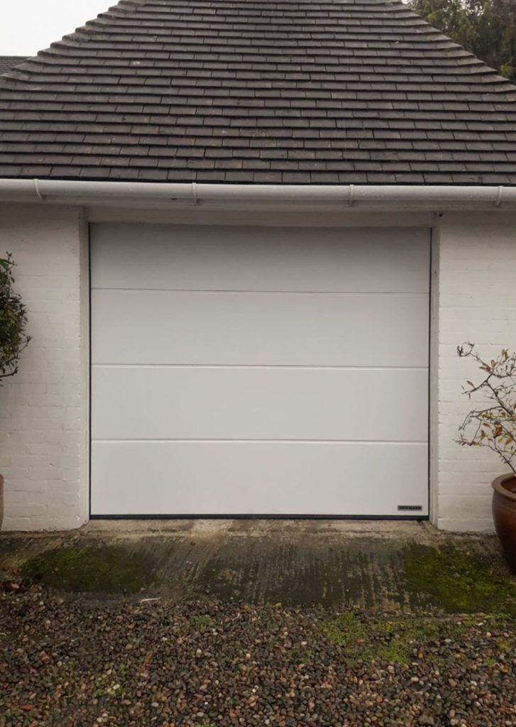 Hormann Insulated Sectional Garage Door Finished in White Silk Grain