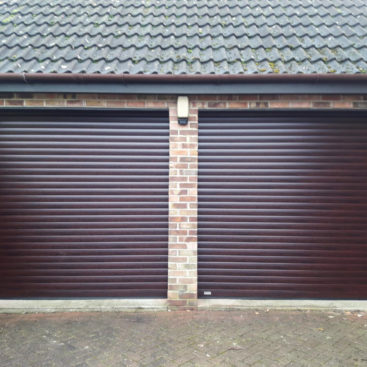 SWS SeceuroGlide Insulated Roller Garage Doors Finished in Woodgrain Rosewood