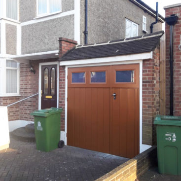 Fort Chester Vertical Ribbed Side Hinged ⅓ Split Garage Doors Finished in Clay Brown