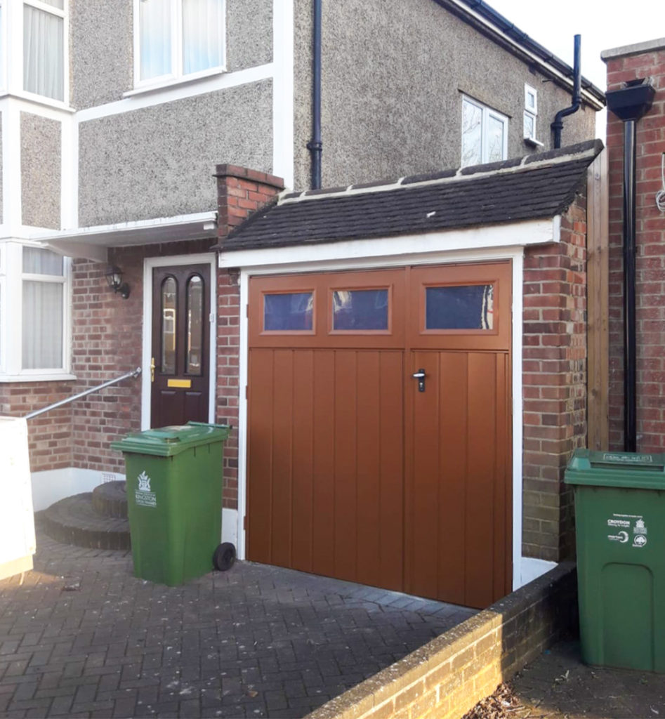 Fort Chester Vertical Ribbed Side Hinged ⅓ Split Garage Doors Finished in Clay Brown