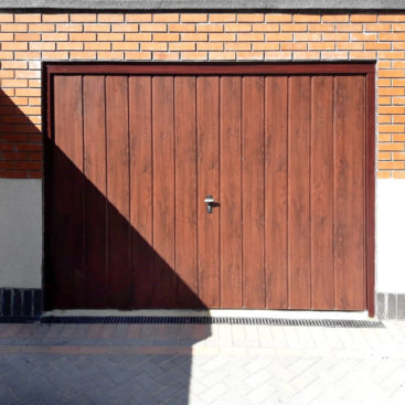 Fort Doors, Vertically Ribbed Up & Over Garage Door, finished in Rosewood Decograin