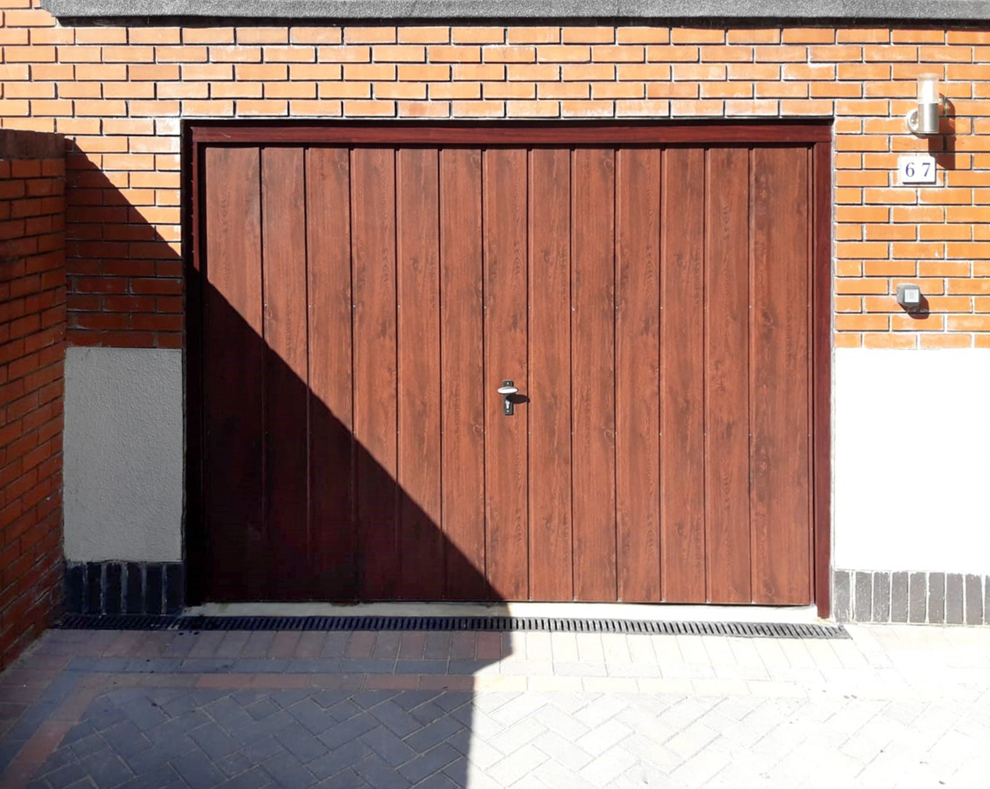 Fort Doors, Vertically Ribbed Up & Over Garage Door, finished in Rosewood Decograin