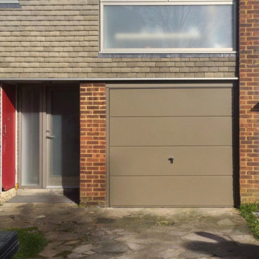 Fort Horizontal Wide-Rib Up and Over Canopy Garage Door in Beige Grey