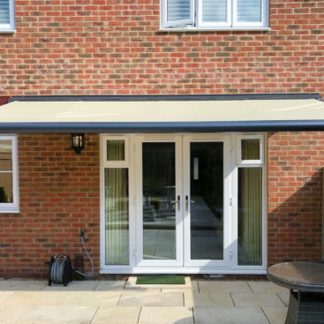 A Markilux 990 Cassette Awning finished with a #31027 Fabric.