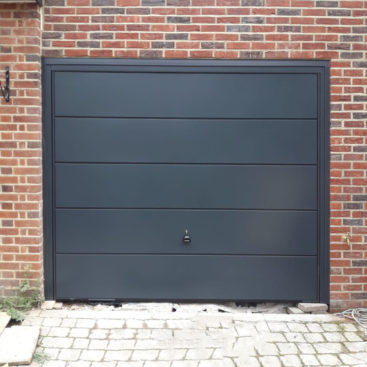 Garador ASCOT wide ribbed Steel Up & Over Garage Door Finished in Anthracite Grey.