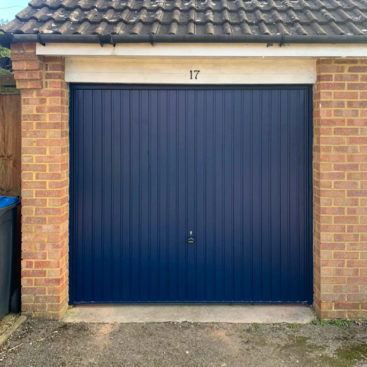 Garador Carlton Vertically Ribbed Canopy Up & Over Garage Door Finished in Steel Blue