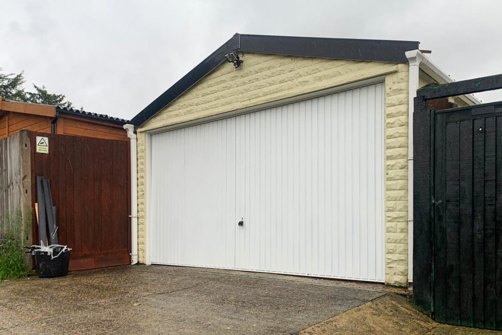 Garador Carlton Vertically Ribbed Retractable Double Up & Over Garage Door Finished in White
