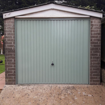 Garador Carlton Canopy Up & Over Garage Door Finished in Chartwell Green