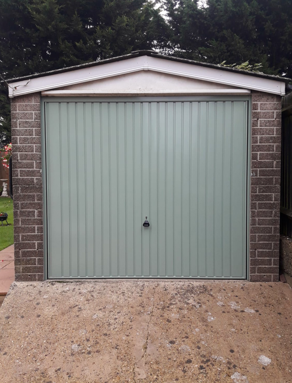 Garador Carlton Canopy Up & Over Garage Door Finished in Chartwell Green