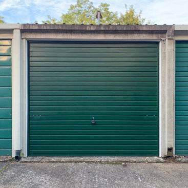 This Garador Steel Up & Over Garage Door Finished in Fir Green