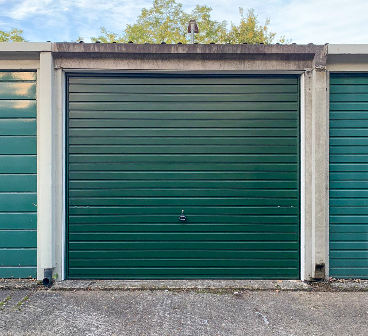 This Garador Steel Up & Over Garage Door Finished in Fir Green