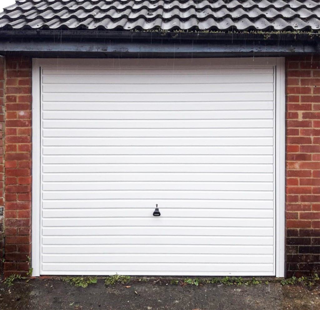 Garador Horizon Steel Up & Over Garage Door Finished in Traffic White & Installed by our Watford Branch.