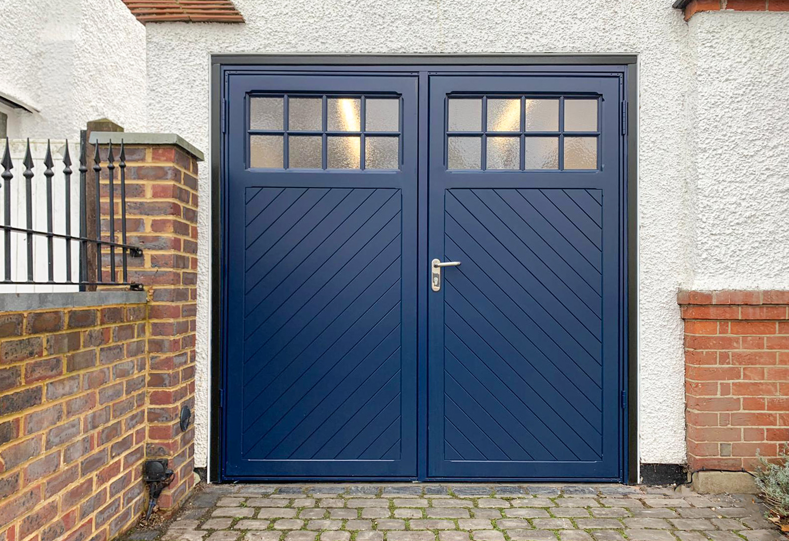 Garador Ashton, 50:50 Side Hinged Garage Doors Finished in Steel Blue