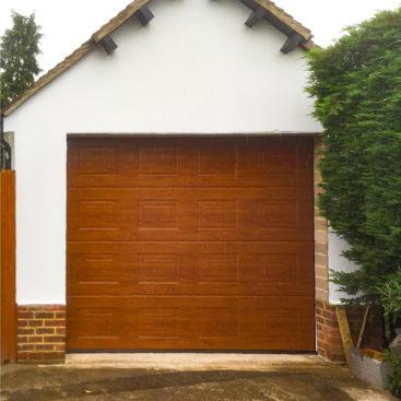 Hormann LPU 42 Panelled Insulated Sectional Garage Door Finished in Decograin Golden Oak