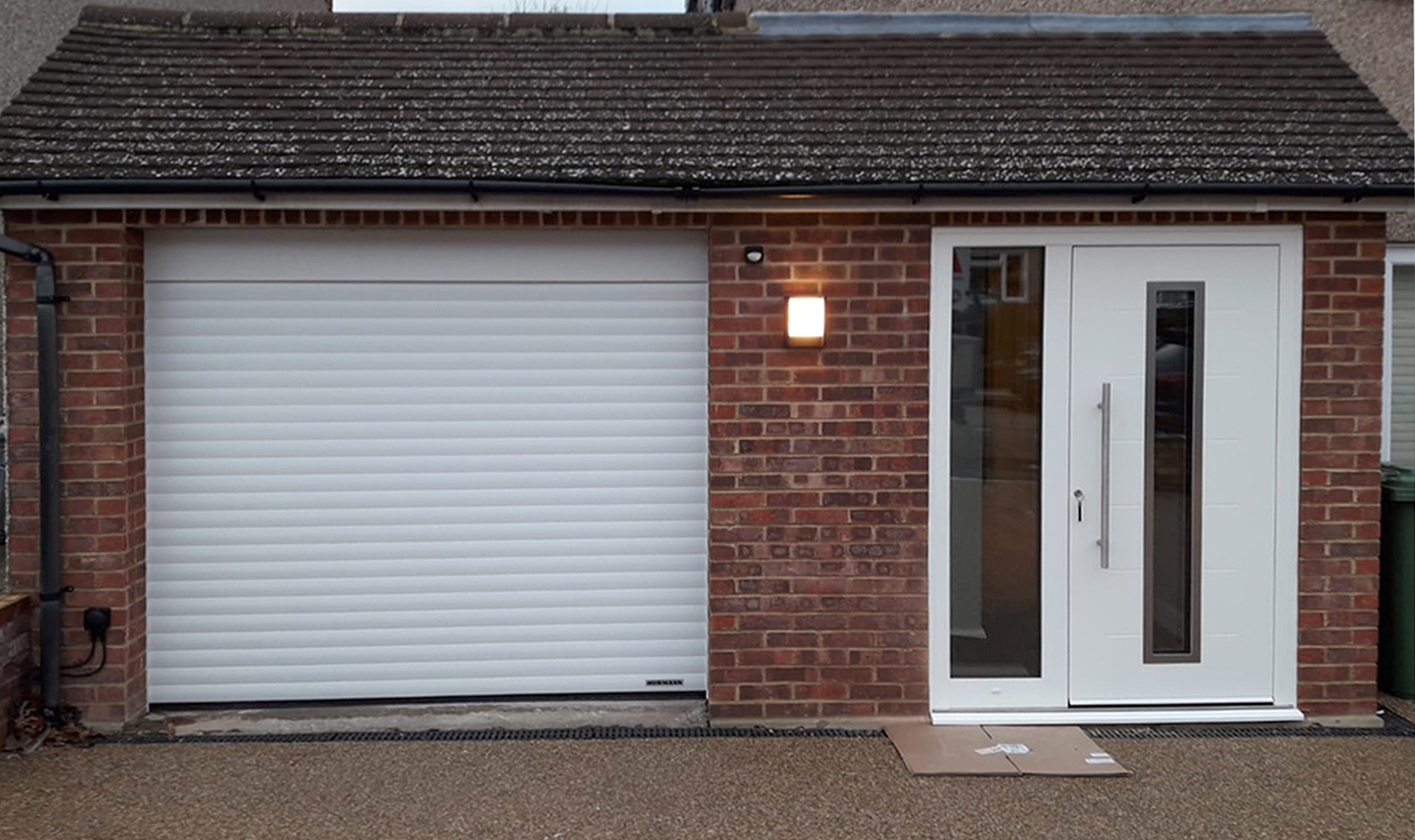 Hormann RollMatic Roller Garage Door & Ryterna RD80 Entrance Door Finished in White