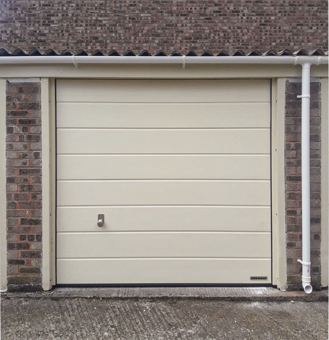 Hormann LPU 42 M Ribbed Insulated Sectional Garage Door Finished in Light Ivory