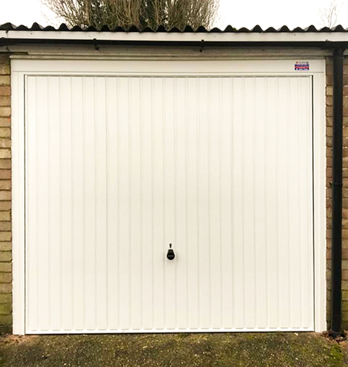 Hormann 2001 Canopy Steel Up & Over Vertically Ribbed Garage Door Finished in Traffic White