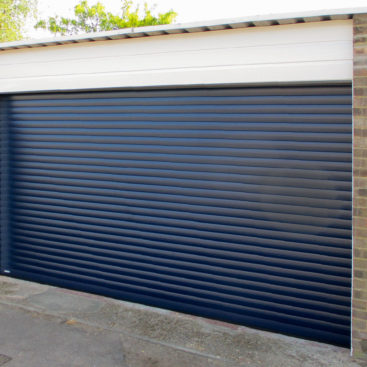 An SWS Classic Roller Garage Door finished in Navy Blue