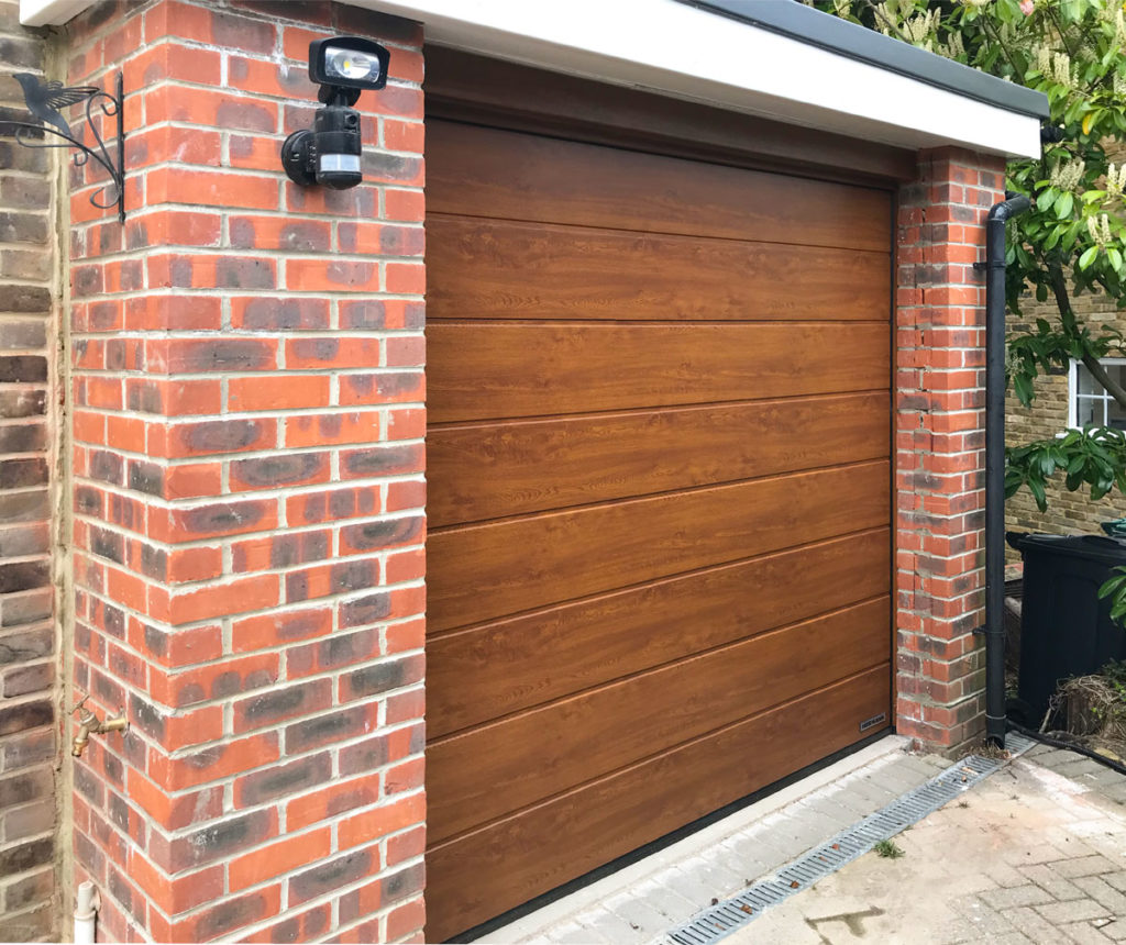 Hormann LPU42 Garage Door in a Golden Oak Decor