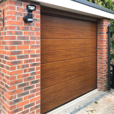 Hormann LPU42 Garage Door in a Golden Oak Decor