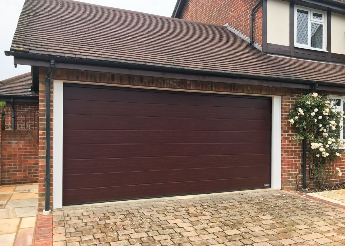 Access Garage Doors Hormann LPU42 MRibbed in Rosewood Decograin