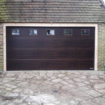 Hormann LPU42 in Mahogany Woodgrain with Windows