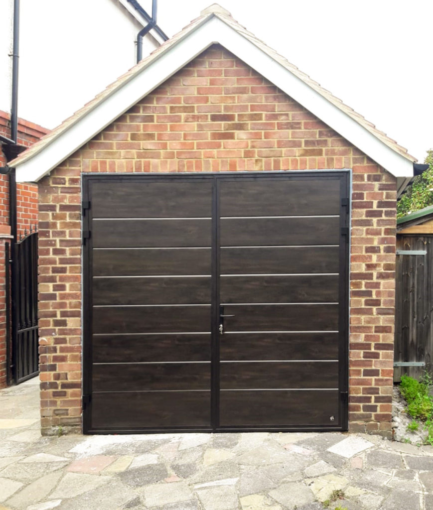 Ryterna Wide Horizontal Ribbed 50:50 Split Side Hinged Garage Doors Finished in Dark Oak Wood Effect