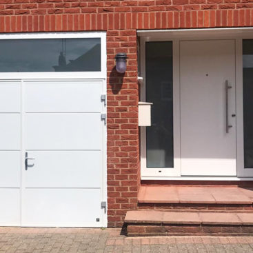 Ryterna Traditional SH2 Side Hinged Garage Doors & Ryterna Entrance Door Finished in White