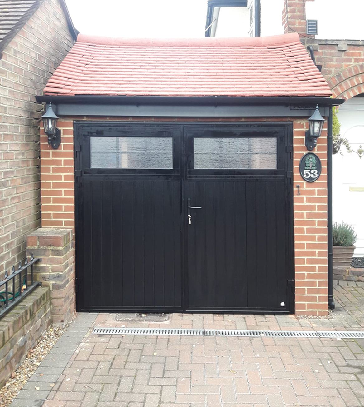 Ryterna Vertical Ribbed Side Hinged Garage Door Finished in Black